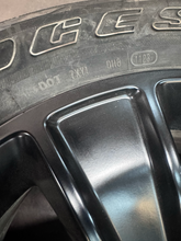 Load image into Gallery viewer, OEM '19-'26 RAM 1500 OEM Black Used Wheels on 275/55R20 Bridgestone HL Tires LT