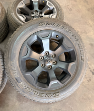 Load image into Gallery viewer, Set of OEM Used '19-'26 RAM 1500 Black Clad Wheels 275/55R20 Bridgestone H/L LT