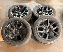 Load image into Gallery viewer, Set of 4 Used OEM 22" '19-'26 RAM 1500 Black Rims 285/45R22 Pirelli Scorpion LT