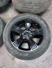 Load image into Gallery viewer, OEM '19-'26 RAM 1500 OEM Black Used Wheels on 275/55R20 Bridgestone HL Tires LT