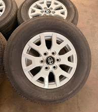 Load image into Gallery viewer, Set of New Takeoff '24-'26 Toyota Tacoma 17" OEM Wheels on 245/70R17 Toyo HT LT