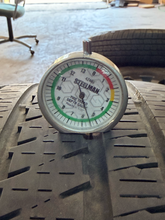 Load image into Gallery viewer, Set of Used 20" Matte Black '19-'26 RAM 1500 OEM Wheels 275/55R20 Bridgestone LT