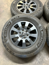Load image into Gallery viewer, OEM 18" '24-'26 Toyota Land Cruiser OEM Used Wheels 265/70R18 Michelin Tires LT