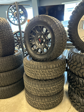 Load image into Gallery viewer, OEM '24-'26 Toyota Tacoma TRD Black Used Wheels 265/65R18 Nitto Nomad Grappler