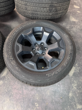 Load image into Gallery viewer, OEM '19-'26 RAM 1500 20" Matte Black Used Wheels on 275/55R20 Bridgestone HL LT