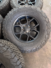 Load image into Gallery viewer, OEM '07-'26 Jeep Wrangler 17" Black Used Rims 285/70R17 BFGoodrich AT Tires LT