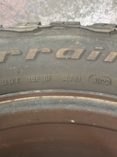 Load image into Gallery viewer, Set of 4 Used OEM '05-'26 RAM 2500 Power Wagon Wheels on 285/70R17 BFGoodrich AT