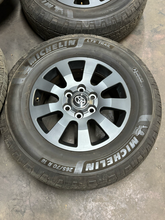 Load image into Gallery viewer, OEM 18" '24-'26 Toyota Land Cruiser OEM Used Wheels 265/70R18 Michelin Tires LT