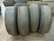 Load image into Gallery viewer, Set of Used Matte Black '19-'25 Dodge RAM 1500 Wheels on 275/55R20 Alenza H/L LT