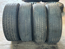 Load image into Gallery viewer, Set of Four Used OEM '22-'25 Toyota Tundra TRD Black Wheels 265/65R20 Tires LT