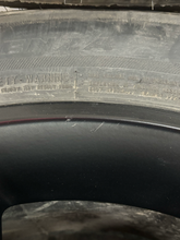 Load image into Gallery viewer, Set of 4 Used 20" Black '19-'26 RAM 1500 OEM Wheels 275/55R20 Bridgestone H/L LT