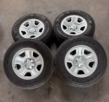 Load image into Gallery viewer, OEM '19-'26 RAM 1500 OEM Steel Used Wheels on 275/65R18 Goodyear H/T Tires LT