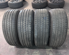 Load image into Gallery viewer, OEM '19-'26 RAM 1500 20" Matte Black Used Wheels on 275/55R20 Bridgestone HL LT
