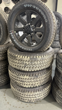 Load image into Gallery viewer, OEM '05-'26 RAM 2500 3500 20" Black Rims 285/60R20 Firestone Transforce AT Tires