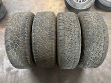 Load image into Gallery viewer, Set of Used '11-'26 GMC Sierra 2500 Denali Ultimate Rims 275/65R20 Goodyear E LT