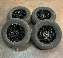 Load image into Gallery viewer, Set of Used '05-'26 Ford F150 Gloss Black Wheels 275/65R18 Goodyear AT Tires LT