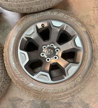 Load image into Gallery viewer, Set of OEM Used '19-'26 RAM 1500 Black Clad Wheels 275/55R20 Bridgestone H/L LT