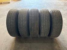 Load image into Gallery viewer, OEM '07-'26 Jeep Wrangler 18" Used Wheels on 255/70R18 Bridgestone HT Tires LT