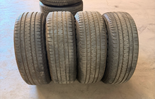 Load image into Gallery viewer, Set of Used 20" '19-'26 RAM 1500 Matte Black Wheels on 275/55R20 Bridgestone LT