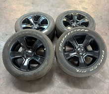 Load image into Gallery viewer, Set of 4 Used 20" Black '19-'26 RAM 1500 OEM Wheels 275/55R20 Bridgestone H/L LT