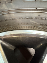 Load image into Gallery viewer, OEM '05-'26 Ford F150 18" Dark Grey Machined Used Rims 275/65R18 Goodyear HT LT