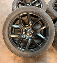 Load image into Gallery viewer, Set of 4 Used 22" '19-'26 RAM 1500 Matte Black Wheels 285/45R22 Pirelli Tires LT