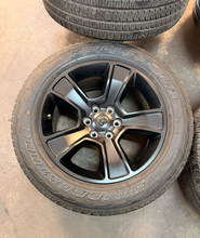 Load image into Gallery viewer, Set of Used 20" Matte Black '19-'26 RAM 1500 OEM Wheels 275/55R20 Bridgestone LT