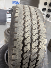 Load image into Gallery viewer, OEM '05-'26 RAM 2500 3500 20" Black Rims 285/60R20 Firestone Transforce AT Tires