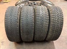Load image into Gallery viewer, Set of Used '05-'26 Ford F-150 Black & Milled OE Wheels 265/70R18 General ATP LT