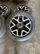 Load image into Gallery viewer, OEM '19-'26 RAM 1500 Charcoal Machined Used Rims 275/55R20 Bridgestone Tires LT