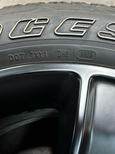 Load image into Gallery viewer, Set of 4 Used '19-'26 RAM 1500 Black 2723 Wheels 275/55R20 Bridgestone Alenza LT