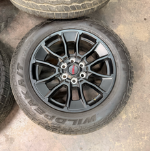 Load image into Gallery viewer, Set of Used '22-'26 Toyota Tundra OEM TRD Black Wheels on 265/60R20 Falken AT LT
