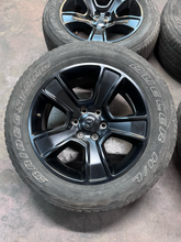 Load image into Gallery viewer, OEM '19-'26 RAM 1500 OEM Black Used Wheels on 275/55R20 Bridgestone HL Tires LT