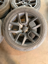 Load image into Gallery viewer, Set of 4 Used OEM 22" '19-'26 RAM 1500 Black Rims 285/45R22 Pirelli Scorpion LT