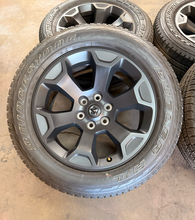 Load image into Gallery viewer, Set of Used 20" '19-'26 RAM 1500 Matte Black Wheels on 275/55R20 Bridgestone LT