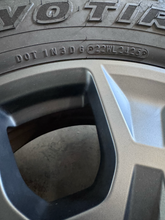 Load image into Gallery viewer, OEM '24-'26 Overtrail+ Lexus GX550 18" Charcoal Used Rims 265/70R18 Toyo AT3 LT