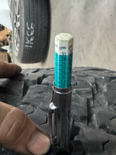 Load image into Gallery viewer, OEM '05-'26 RAM 2500 Power Wagon Used Black Rims 285/70R17 Goodyear Duratrac LT