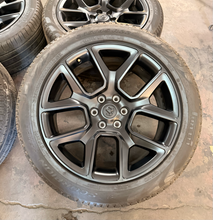 Load image into Gallery viewer, Set of 4 Used Black '19-'26 RAM 1500 22" Wheels 285/45R22 Pirelli All Season LT