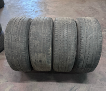 Load image into Gallery viewer, OEM '19-'26 RAM 1500 OEM Black Used Wheels on 275/55R20 Bridgestone HL Tires LT