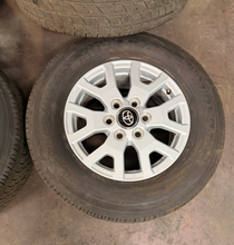 Load image into Gallery viewer, Set of New Takeoff '24-'26 Toyota Tacoma 17" OEM Wheels on 245/70R17 Toyo HT LT