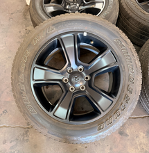 Load image into Gallery viewer, Set of Used Black '19-'26 RAM 1500 OEM Wheels 275/55R20 Bridgestone HL Tires LT