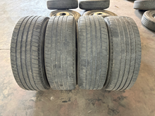 Load image into Gallery viewer, OEM '05-'26 RAM 2500 20" Polished Used Wheels on 285/60R20 Michelin Defender LT