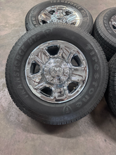 Load image into Gallery viewer, OEM '05-'26 RAM 2500 Steel Used Chrome Clad Wheels on 275/70R18 Firestone HT2 LT