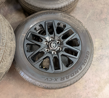 Load image into Gallery viewer, Set of OEM Takeoff '22-'26 Toyota Tundra 20" Black OEM Wheels 265/60R20 Tires LT