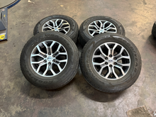 Load image into Gallery viewer, OEM '05-'26 Ford F150 18" Dark Grey Machined Used Rims 275/65R18 Goodyear HT LT