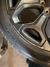 Load image into Gallery viewer, Set of Used '19-'26 RAM 1500 2727 Dark Charcoal Rims 285/45R22 Open Range HTS LT
