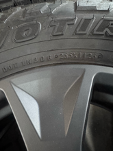 Load image into Gallery viewer, OEM '24-'26 Overtrail+ Lexus GX550 18" Charcoal Wheels on 265/70R18 Toyo AT3 LT
