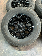 Load image into Gallery viewer, Set of Used '05-'26 Ford F150 Gloss Black Wheels 275/65R18 Goodyear AT Tires LT