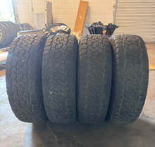 Load image into Gallery viewer, OEM '24-'26 Toyota Land Cruiser 18" Used Wheels on 265/70R18 Toyo AT3 Tires LT