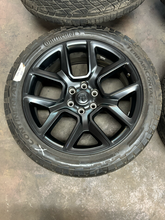 Load image into Gallery viewer, Set of 4 Used 22" Black '19-'26 RAM 1500 Wheels 285/45R22 Terrain Contact AT LT